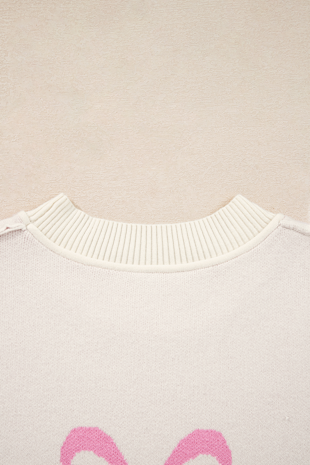 Pink Bow Print Ribbed Trim Exposed Seam Drop Shoulder Loose Sweater