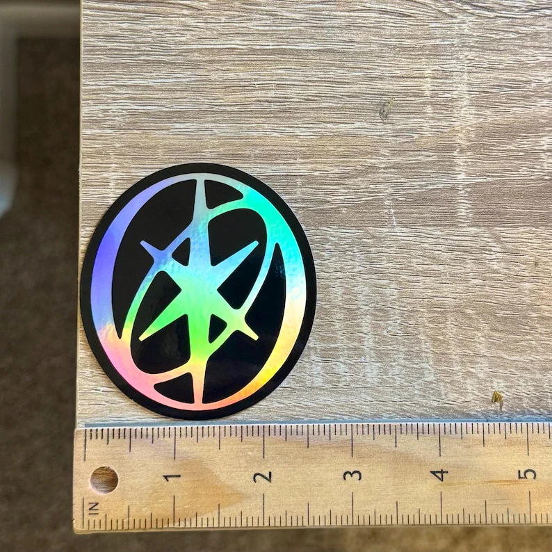 KATSEYE Holographic Logo Sticker Weatherproof Eyekons - KATSEYE MERCH​