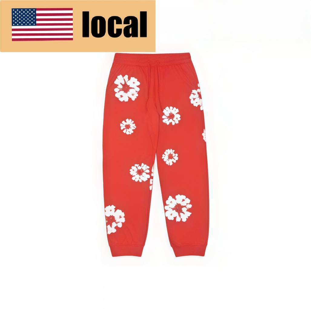 Denim Tears color-block garland-print lace-up track pants - Lulualo