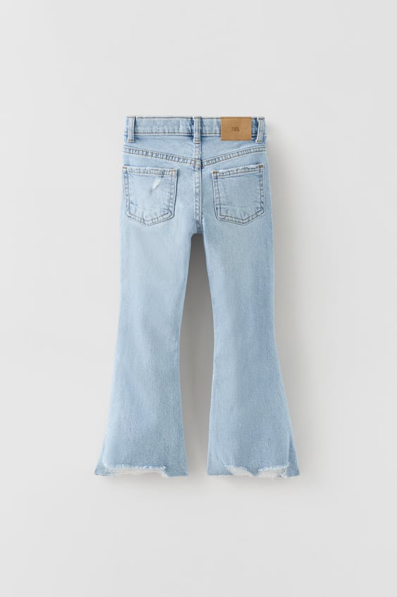 RIPPED FLARED JEANS