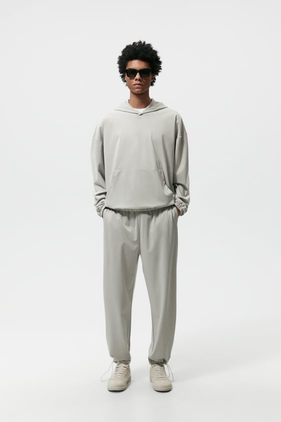 HOODED TECHNICAL SWEATSHIRT