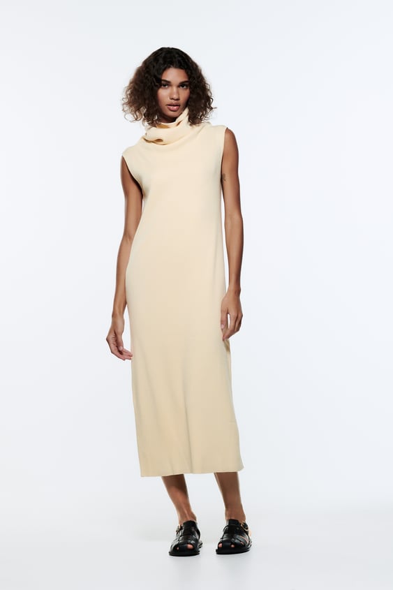 SLEEVELESS KNIT DRESS