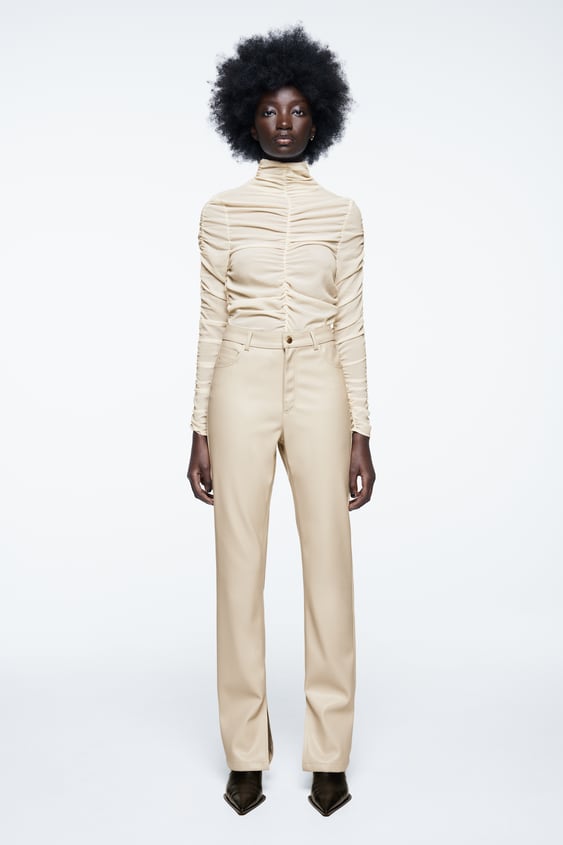 FAUX LEATHER FLARED SLIM PANTS