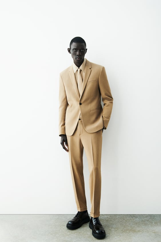 TEXTURED SUIT PANTS