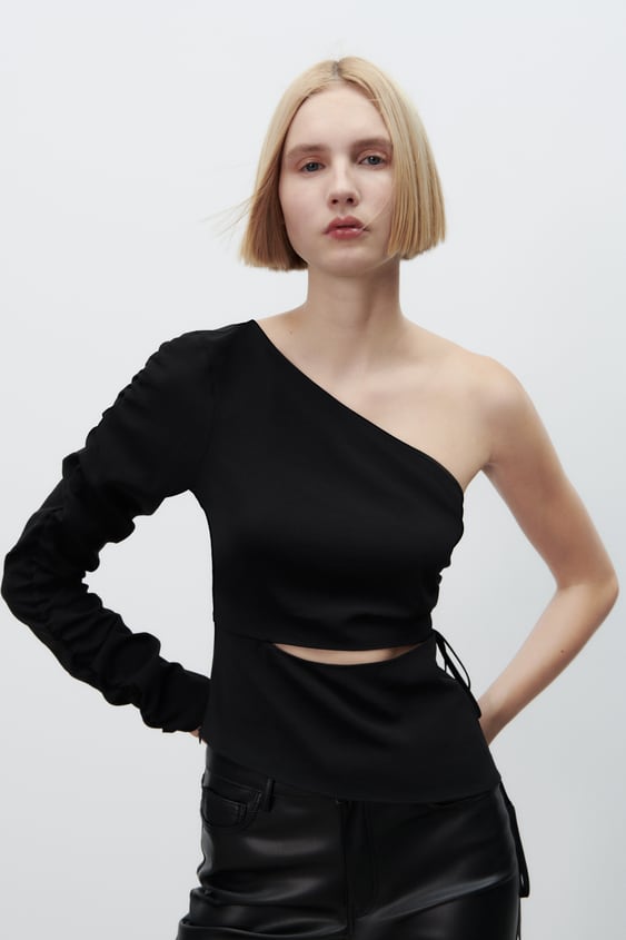 ASYMMETRIC CUT OUT TOP