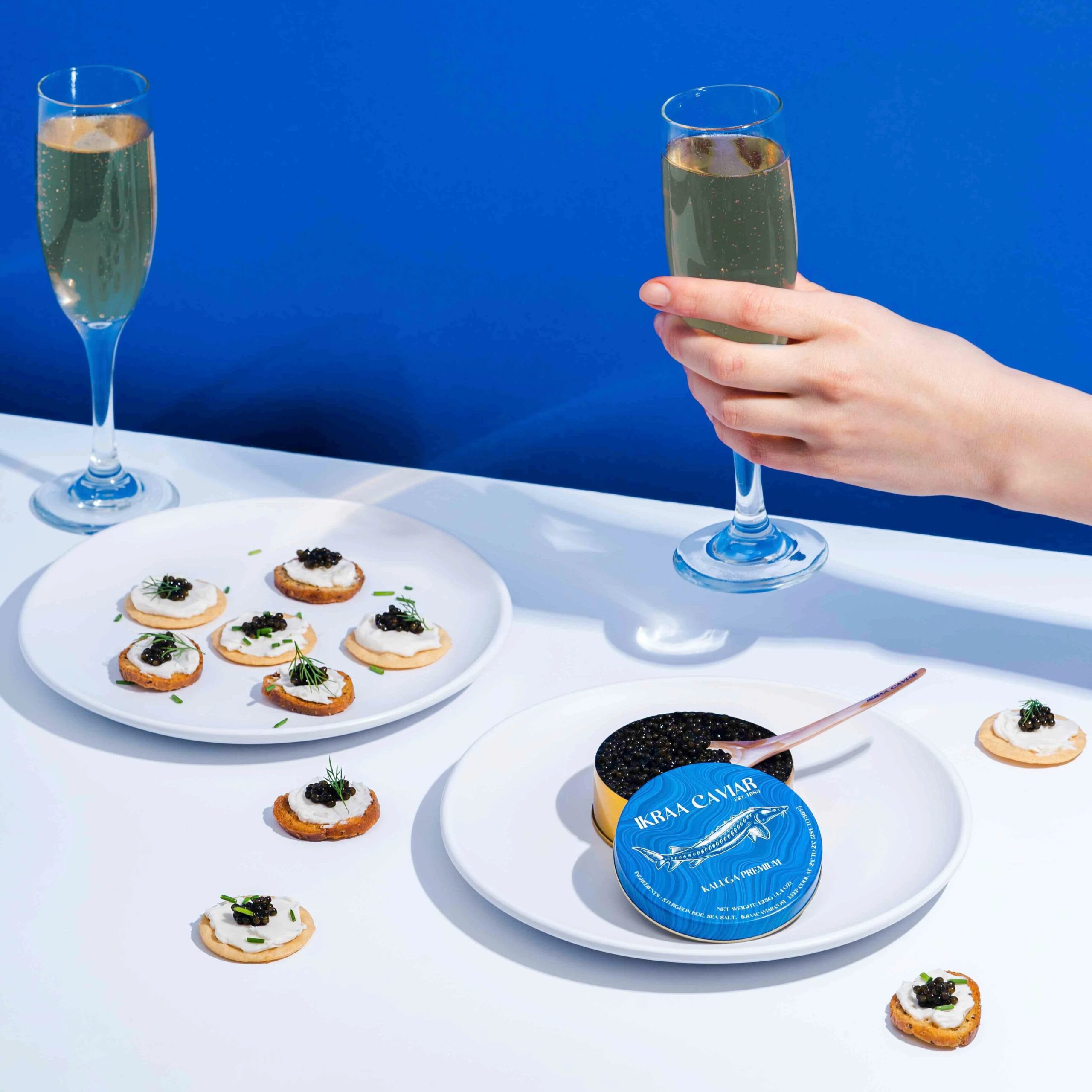 IKRAA Caviar Picnic Pack for Two with French Blinis, Truffle Butter & Pearl Spoons, 4 oz Premium Caviar