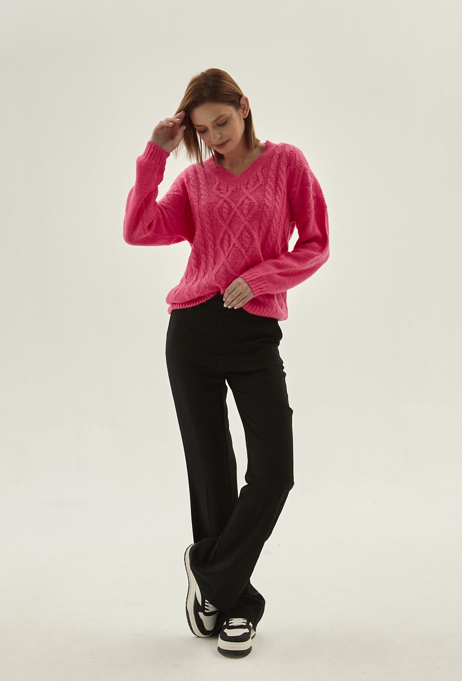 Sweter o warkoczowym splocie