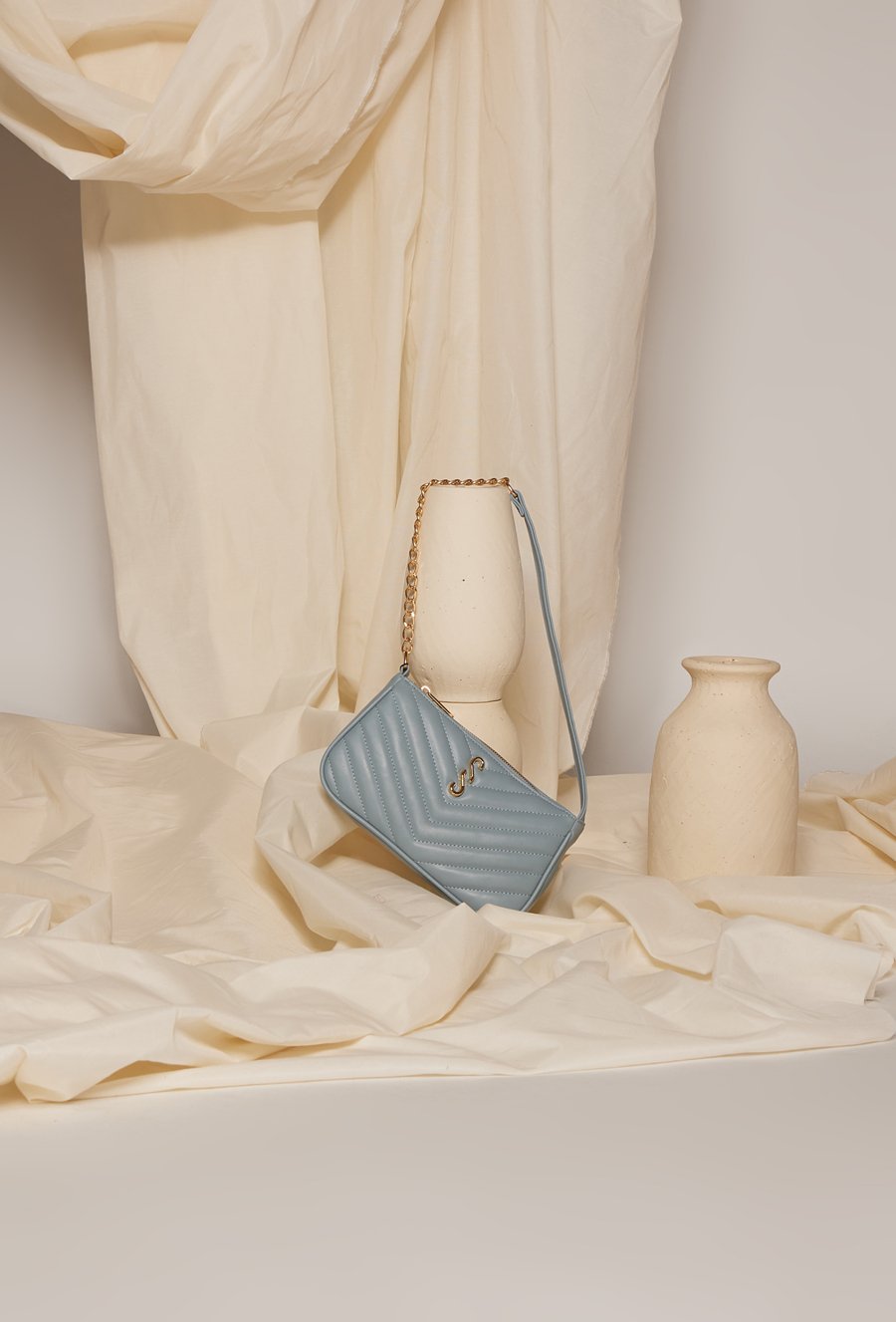 Pikowana mała torba damska