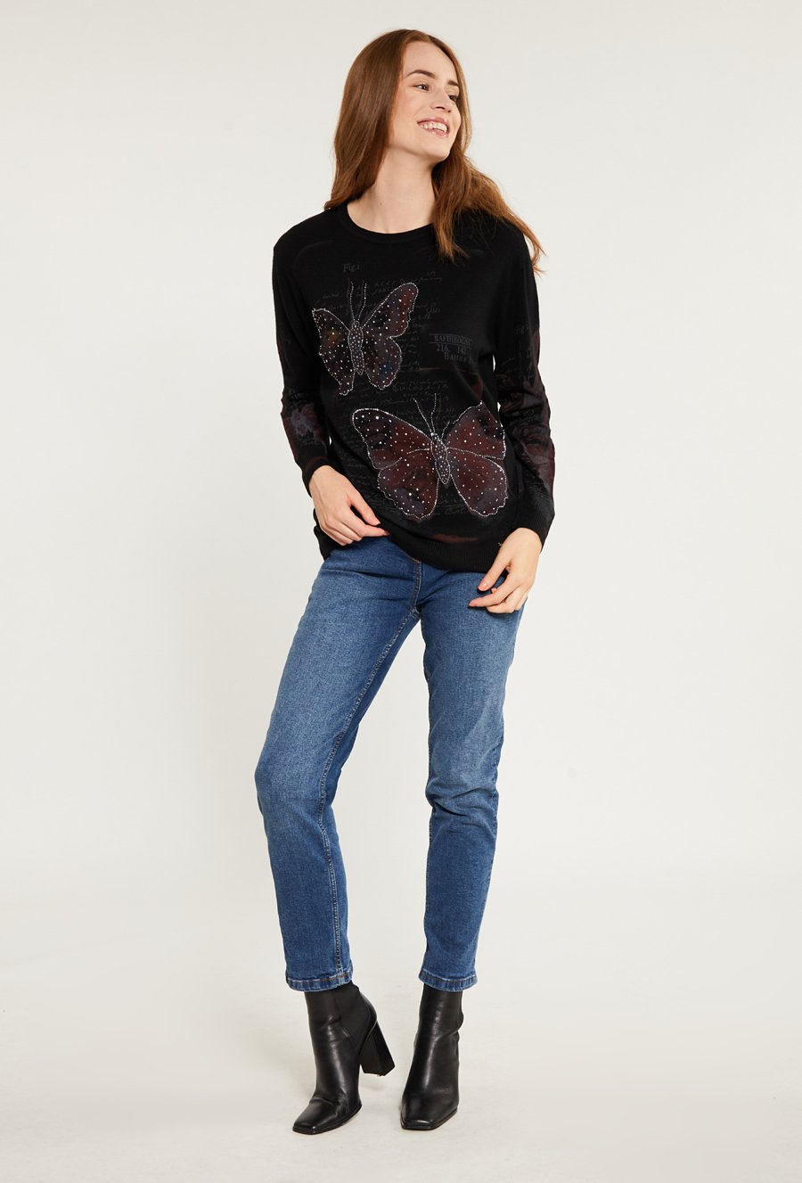 Wzorzysty sweter z dżetami