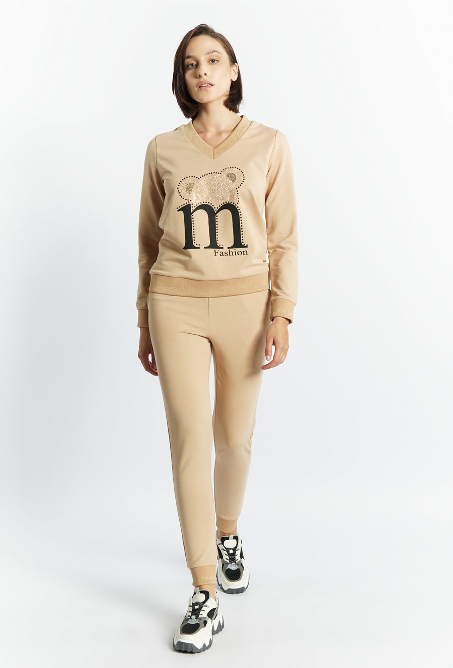 Spodnie damskie z połyskującym wiązaniem