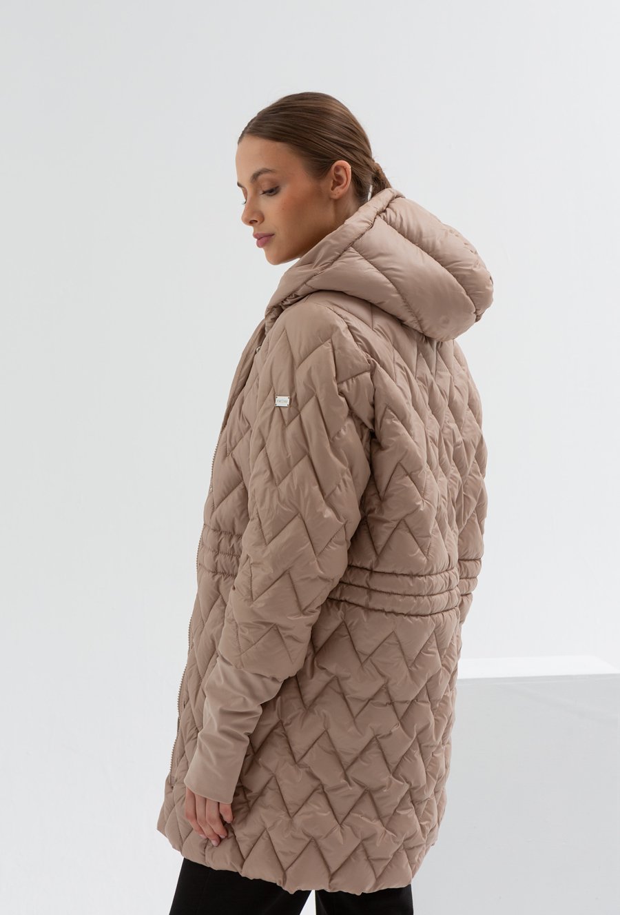 Pikowana kurtka w jodełkę