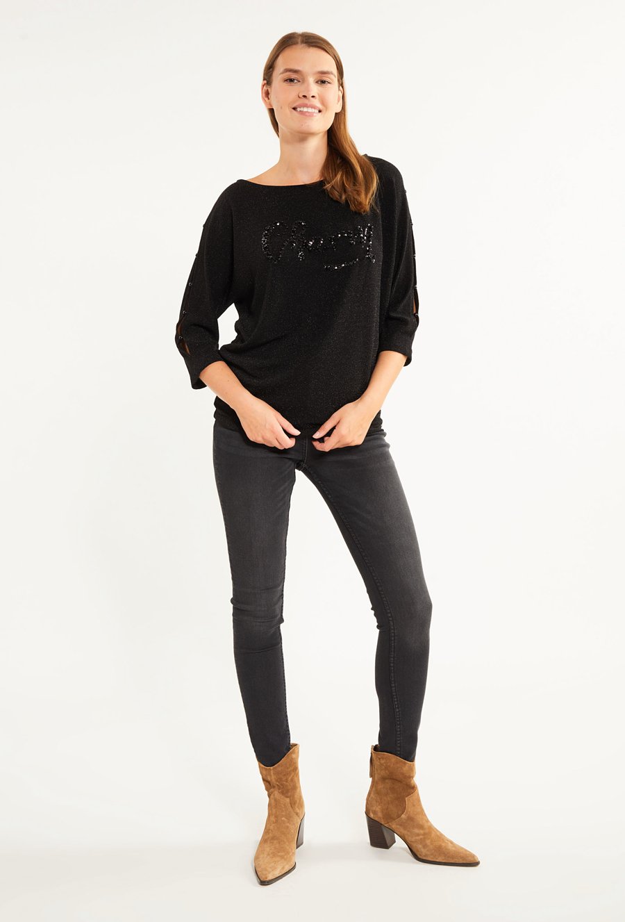 Błyszcząca bluzka damska z biżuteryjnym napisem