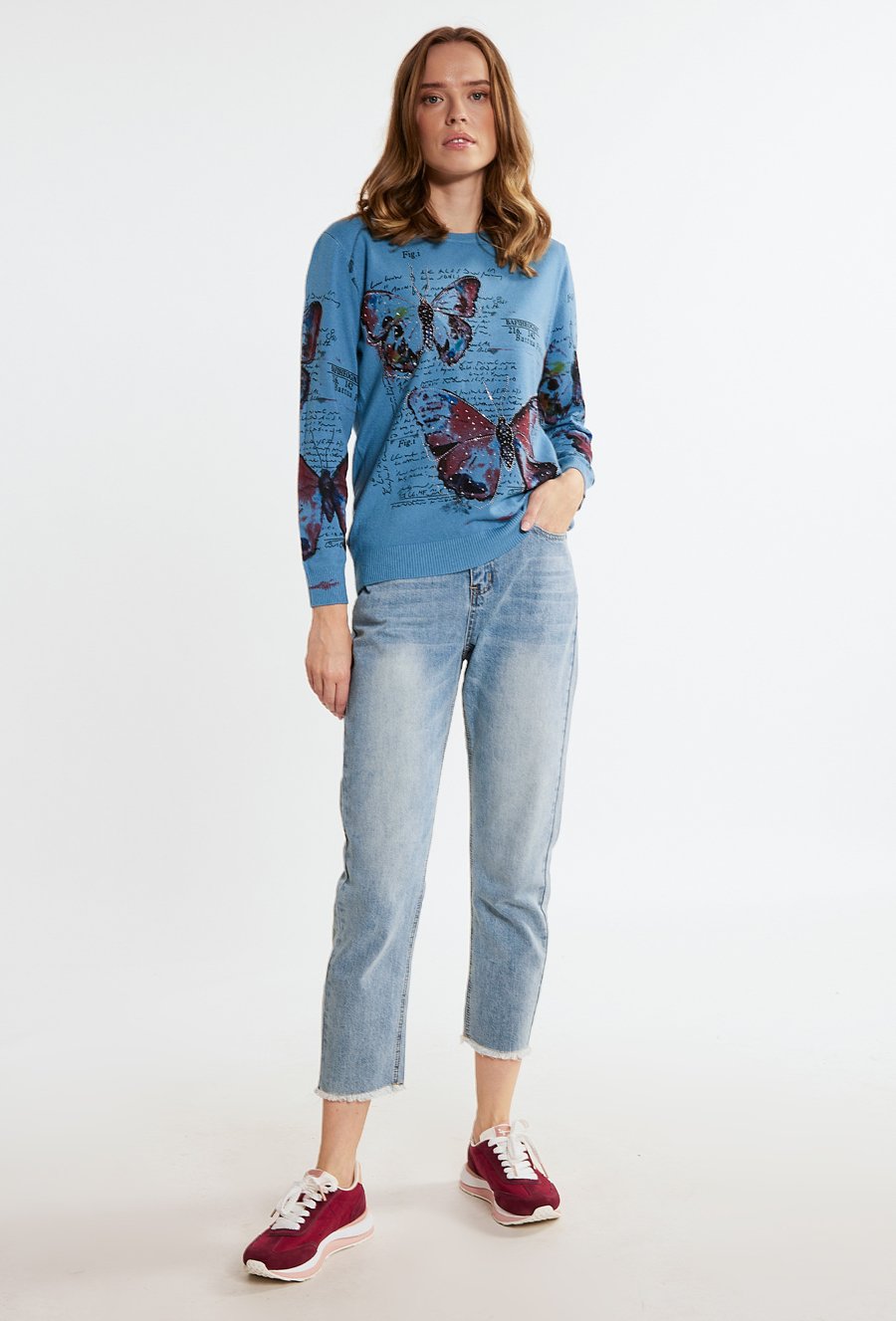 Wzorzysty sweter z dżetami