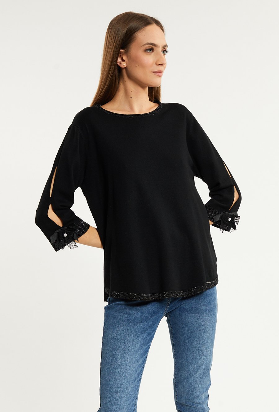 Sweter z ozdobnymi kokardkami