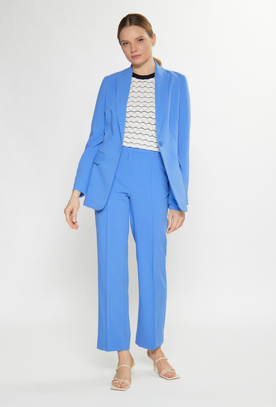 Materiałowe spodnie z szeroką nogawką