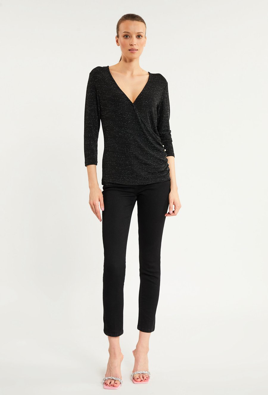 Błyszcząca bluzka o kopertowym kroju