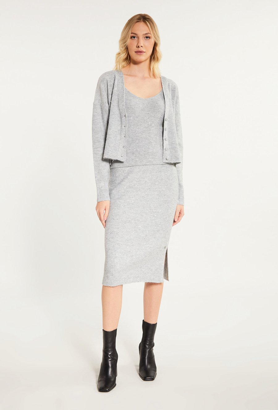 Połyskujący sweter damski