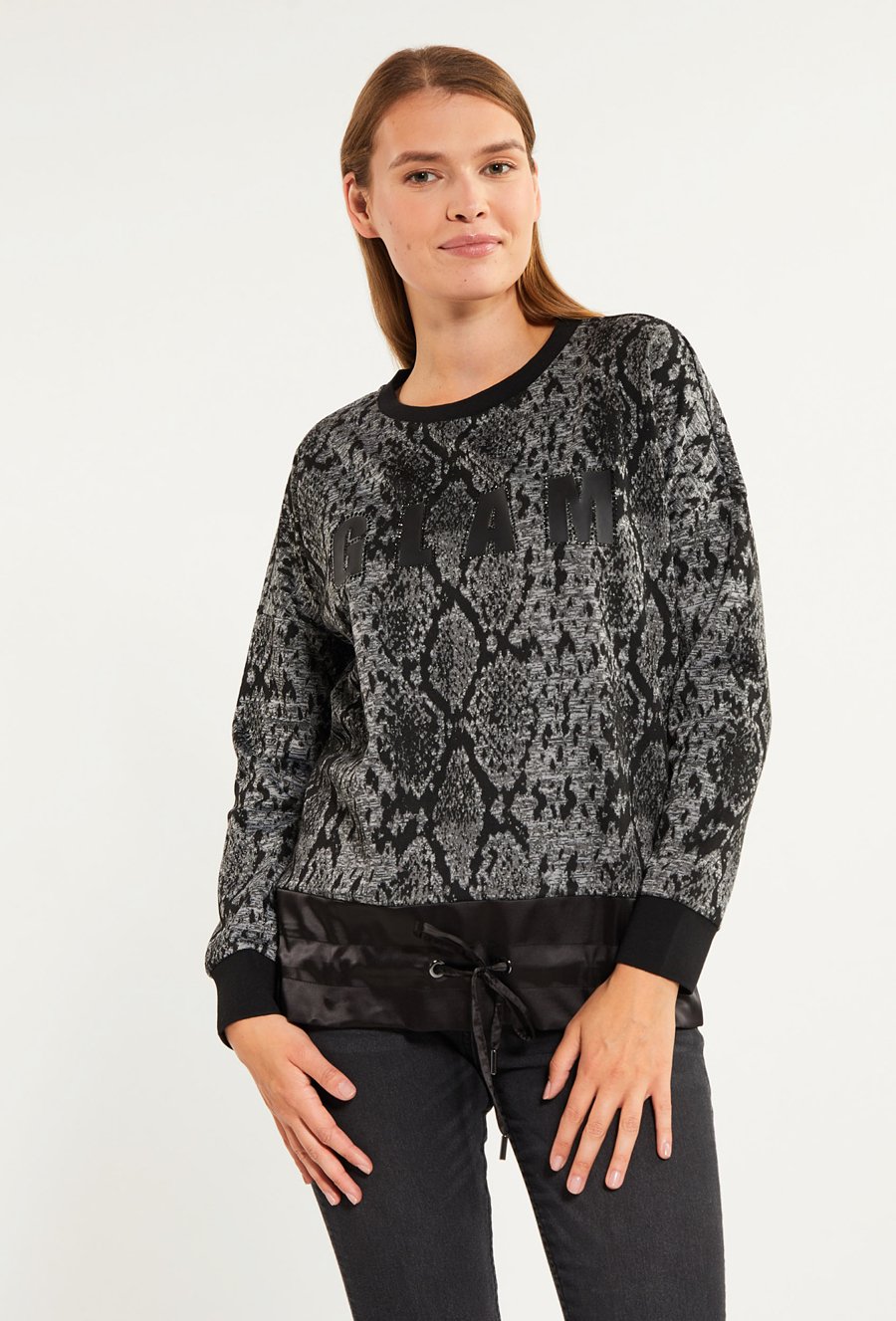 Wzorzysta bluza damska z wiązaniem