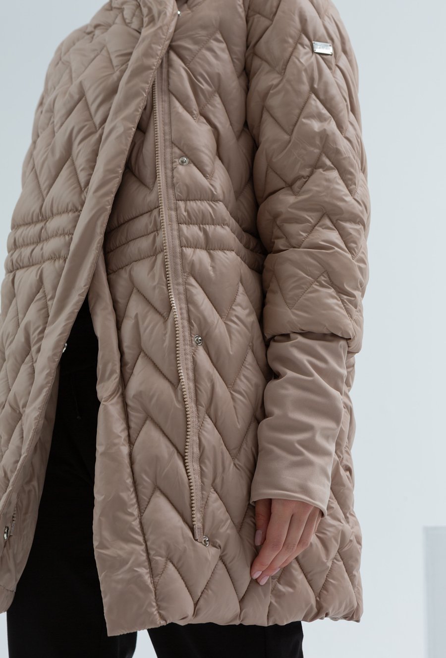 Pikowana kurtka w jodełkę