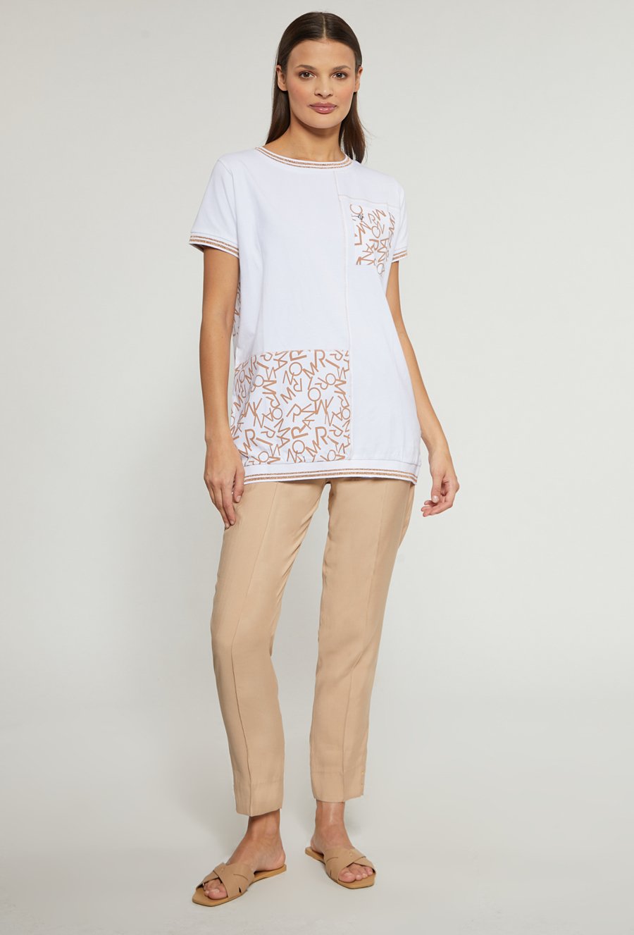 Bawełniana bluzka damska z ozdobnymi naszyciami