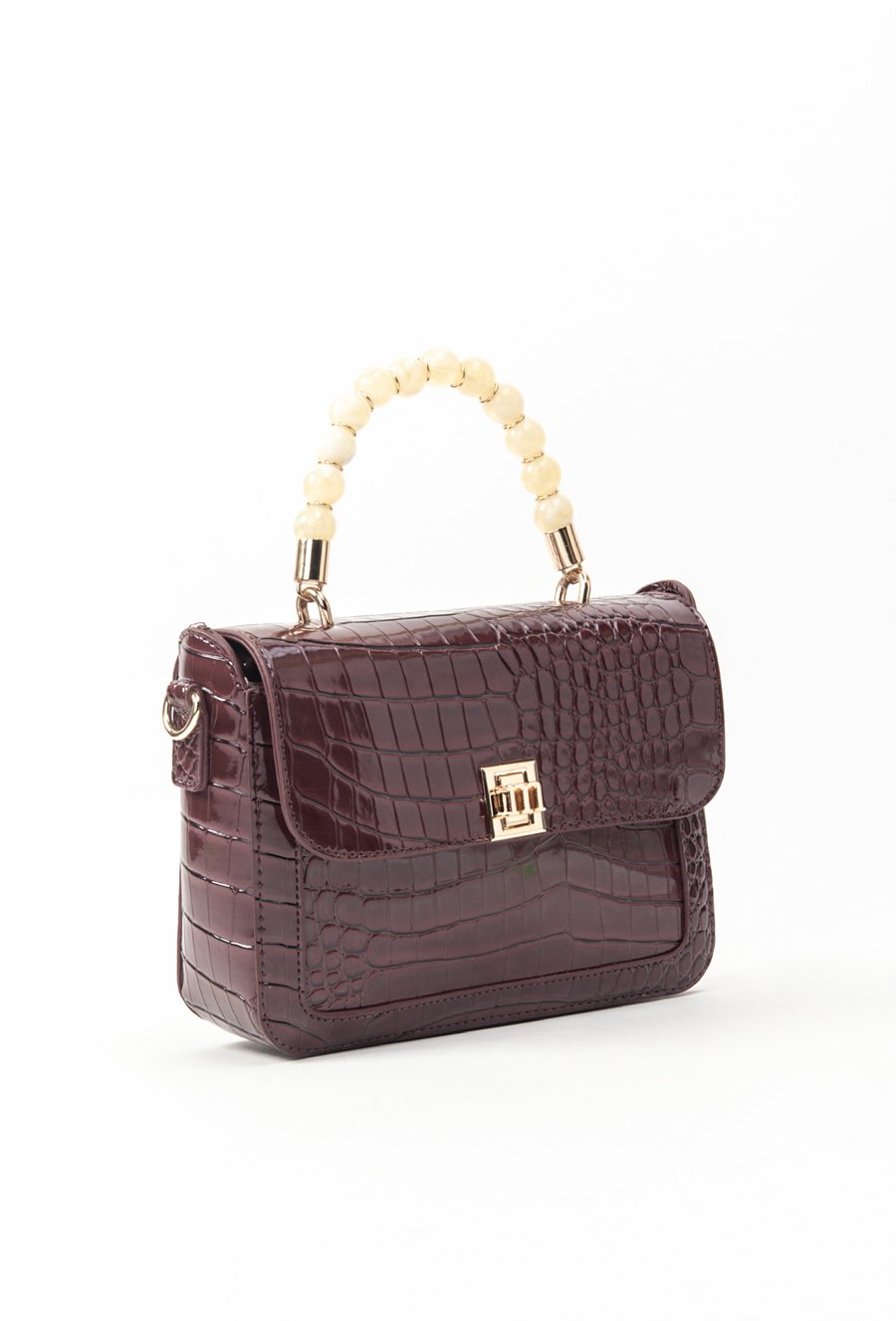 Lakierowy kuferek damski z wzorem