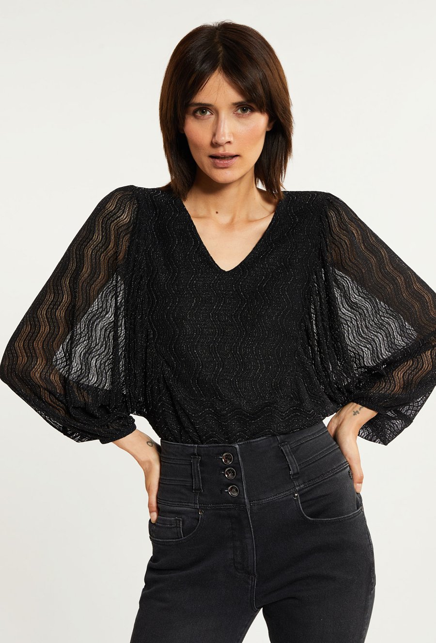 Błyszcząca bluzka damska