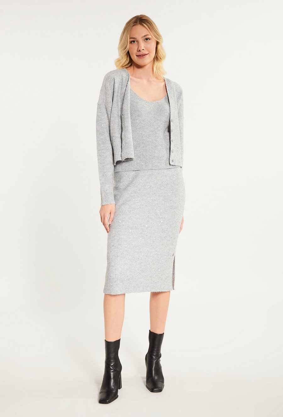 Połyskujący sweter damski