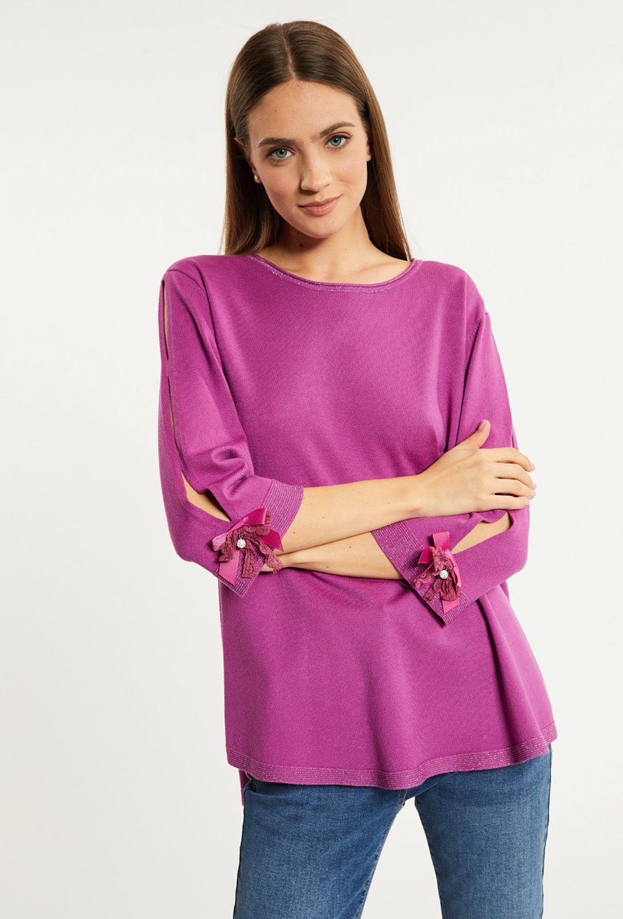 Sweter z ozdobnymi kokardkami