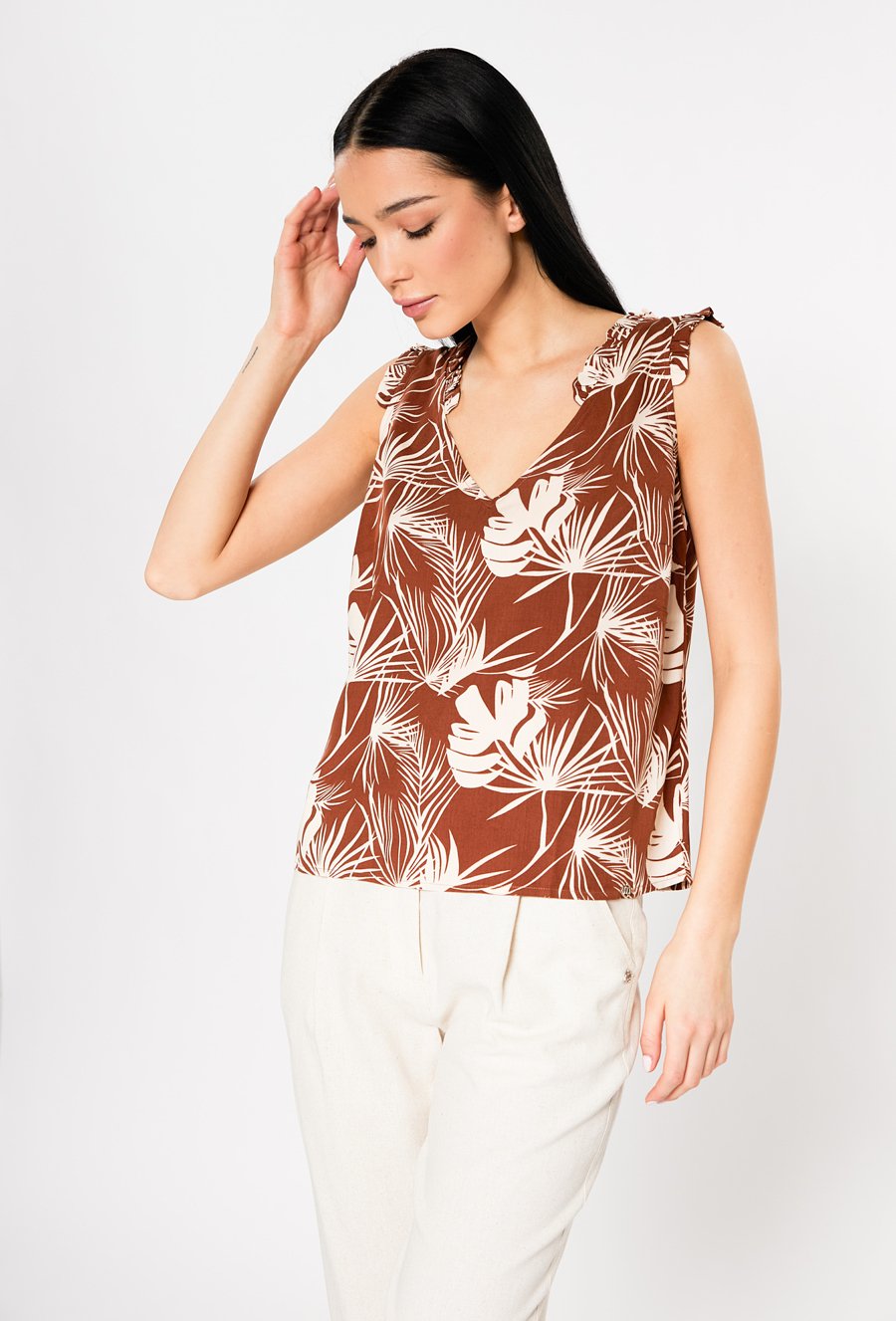 Bluzka damska z ozdobnymi falbankami