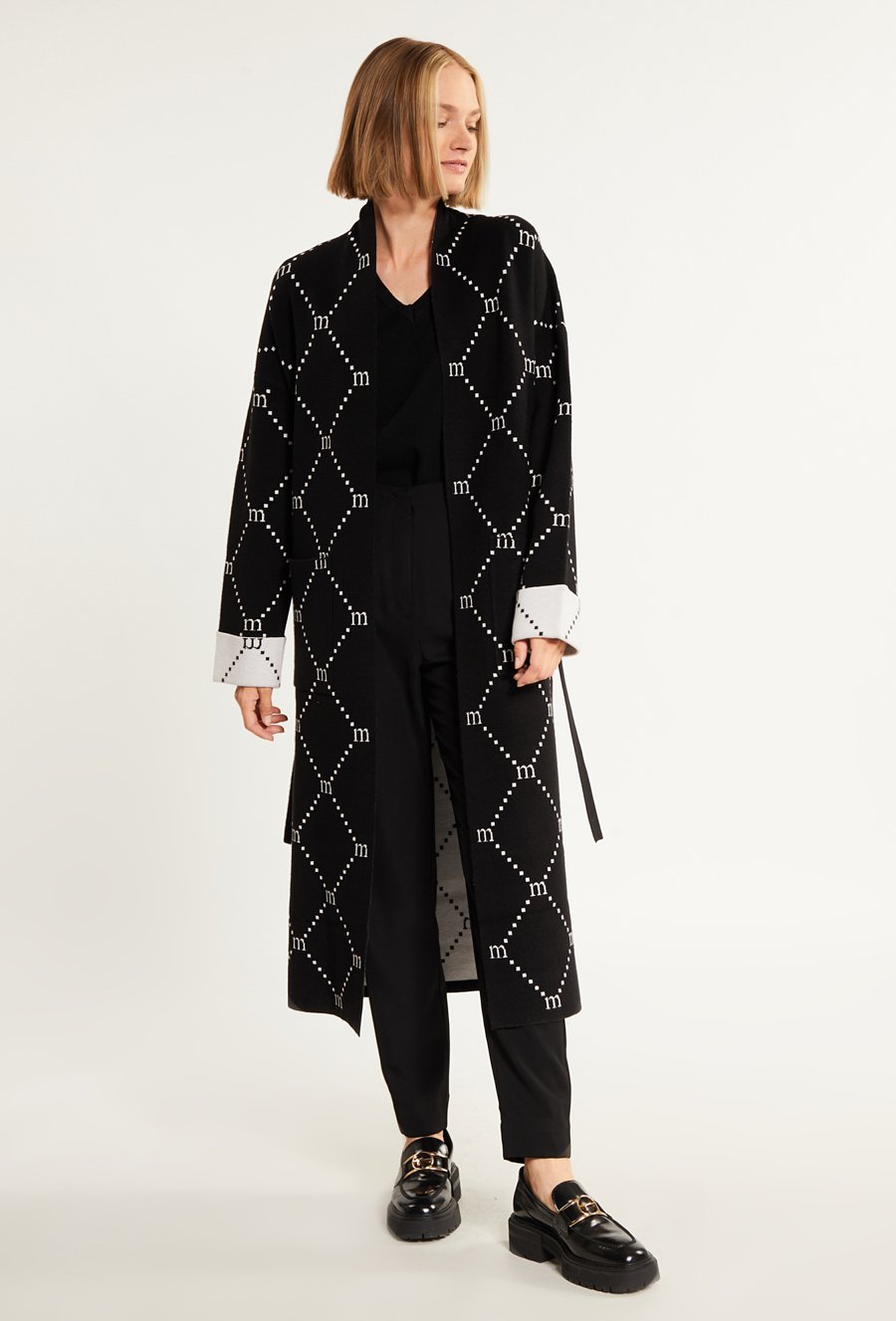 Swetrowy płaszcz damski