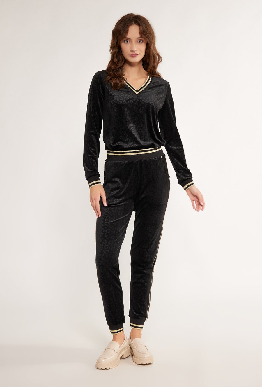 Welurowe spodnie z wzorem w cętki