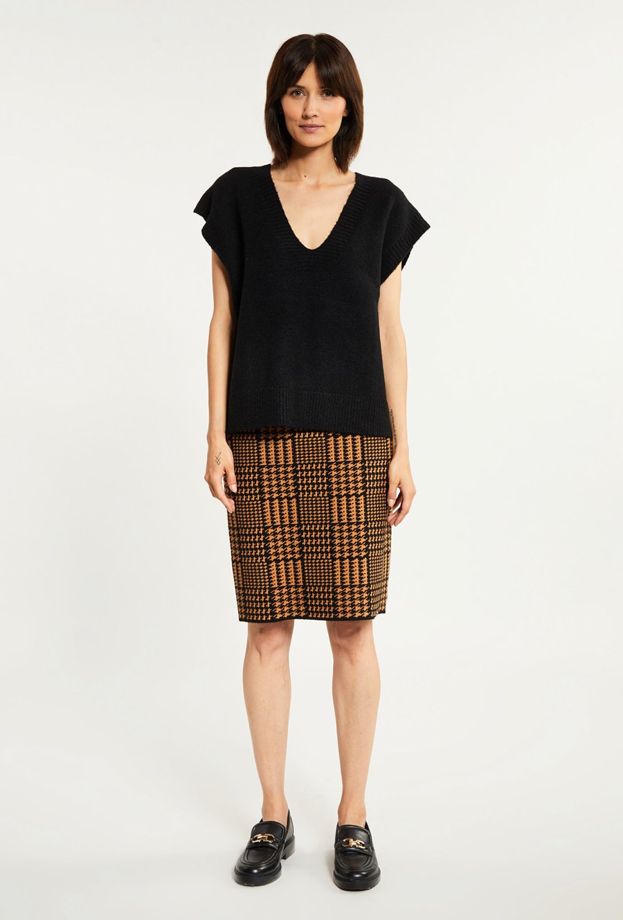 Oł&oacute;wkowa sp&oacute;dnica z wzorem w pepitkę