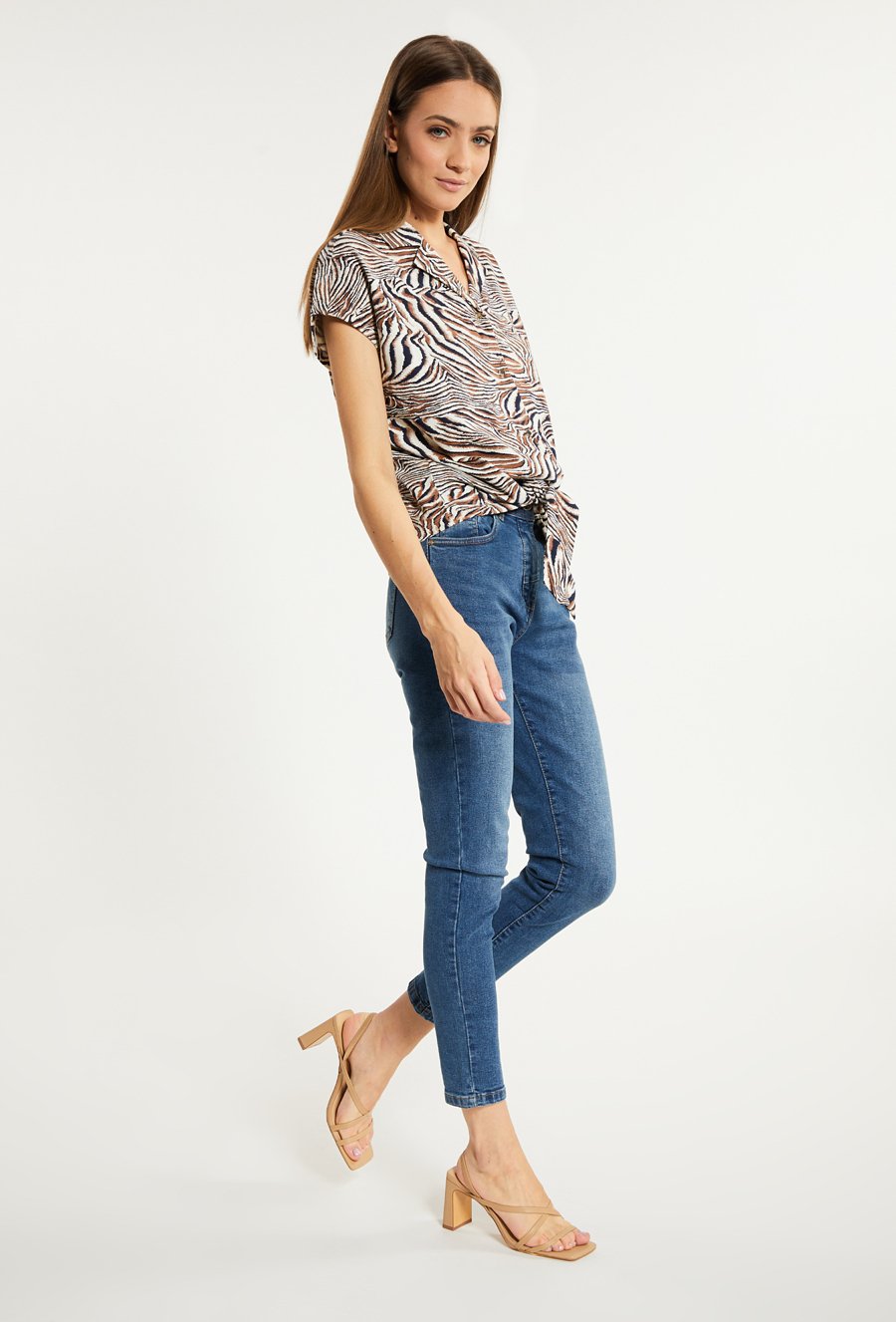 Wzorzysta bluzka damska z wiązaniem u dołu