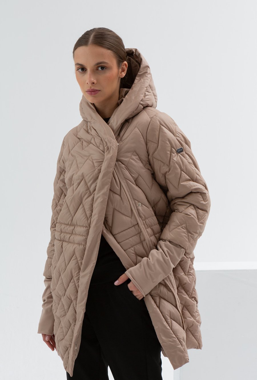 Pikowana kurtka w jodełkę