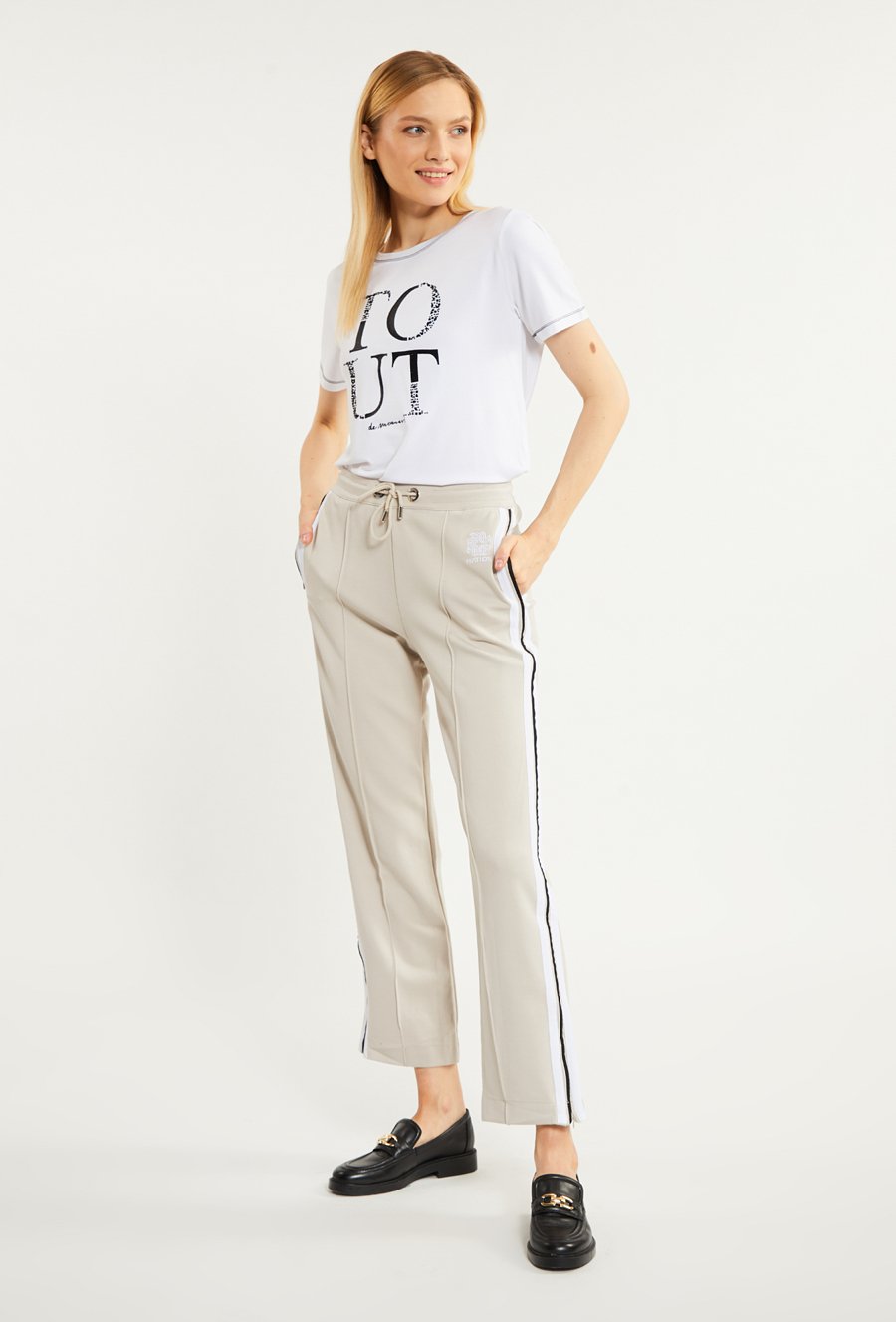 Materiałowe spodnie damskie z lampasami