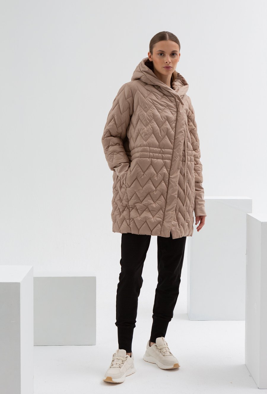 Pikowana kurtka w jodełkę