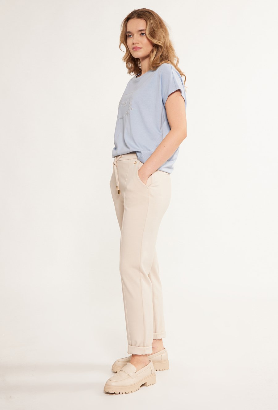 Materiałowe spodnie damskie